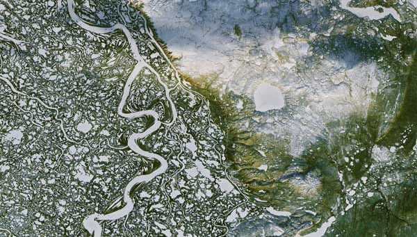 Watersheds are highly interconnected, often spanning geographical and political boundaries. Mackenzie River Delta, Northwest Territories .